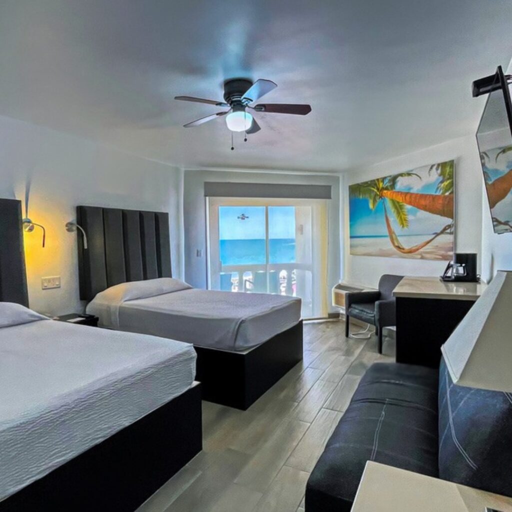Oceanfront hotel room at Playa Bonita Resort in Rocky Point with two beds and sea view