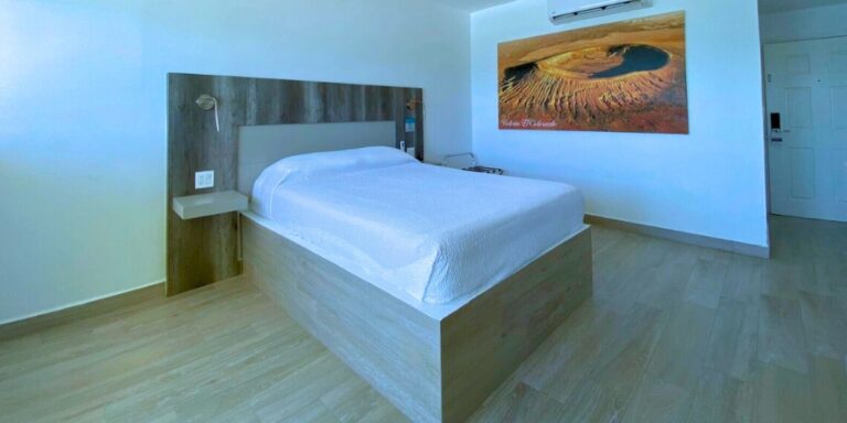Single room with comfortable bed at Playa Bonita Resort in Rocky Point