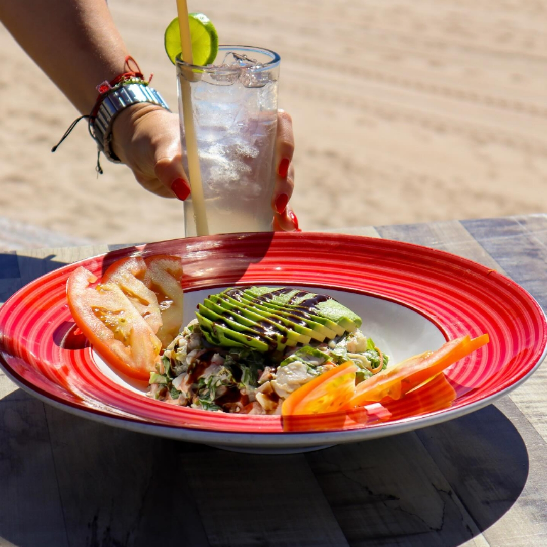 Fresh seafood salad with avocado and tomatoes served seaside at La Bonita Cevichería in Rocky Point